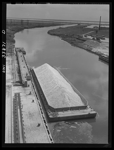 Freeport Sulphur Company, Grand Ecaille, Louisiana. Barge loaded with sulphur
