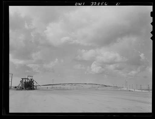 Freeport Sulphur Company, Grand Ecaille, Louisiana. Melted sulphur pouring into a vat