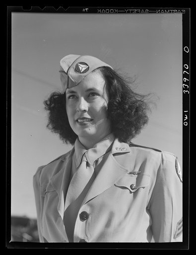 Corpus Christi, Texas. Seargent Pat Pate, who formerly worked in a law office in Corpus Christi, now a member of the Civil Air Patrol