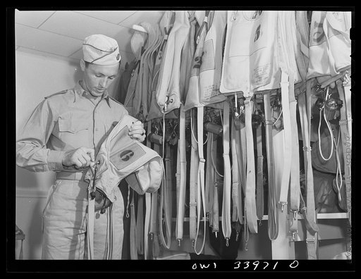 Corpus Christi, Texas. Lieutenant Bill Horne, a Civil Air Patrol pilot, with a "Mae West" (life jacket). Lieutenant Horne is from Lubbock, Texas