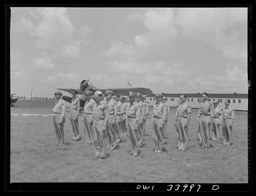 Corpus Christi, Texas. Officers of the Civil Air Patrol lined up in front of the planes for inspection