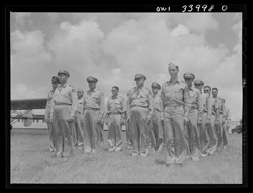 Corpus Christi, Texas. Officers of the Civil Air Patrol lined up in front of the planes for inspection