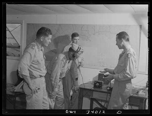 Corpus Christi, Texas. Lieutenant Ronnie Durham, a member of the Civil Air Patrol, instructing flight officers in radio telephone technique