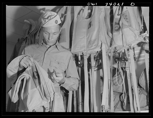Untitled photo, possibly related to: Corpus Christi, Texas. Lieutenant Bill Horne, a Civil Air Patrol pilot, with a "Mae West" (life jacket). Lieutenant Horne is from Lubbock, Texas