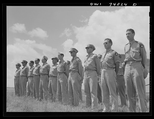 Corpus Christi, Texas. Officers of the Civil Air Patrol lined up in front of the planes for inspection