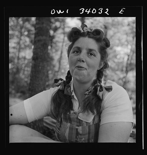 Untitled photo, possibly related to: Turkey Pond, near Concord, New Hampshire. Women workers employed by a U.S. Department of Agriculture timber salvage sawmill. Mrs. Violet Storey, "takes away," is a farmer's wife with six children