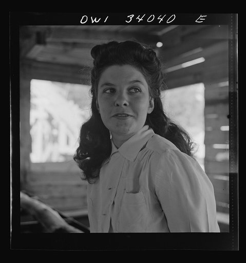 Turkey Pond, near Concord, New Hampshire. Women workers employed by a U.S. Department of Agriculture timber salvage sawmill. Barbara Webber, twenty-one year old edger, finds her job harder physically than working in a laundry, but she likes it better because it isn't so tedious and nerve-racking