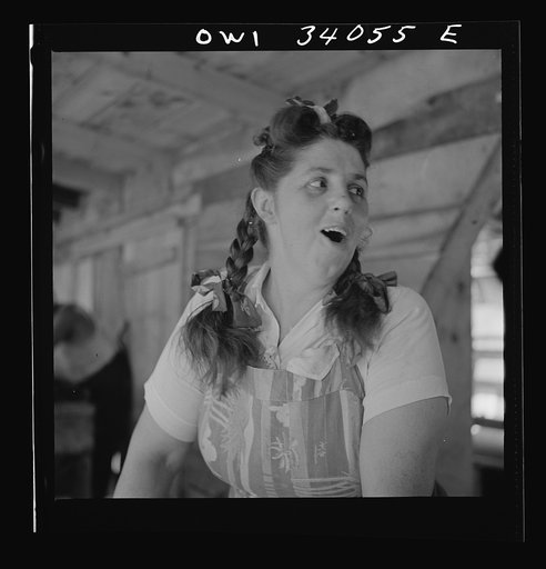 Untitled photo, possibly related to: Turkey Pond, near Concord, New Hampshire. Women workers employed by a U.S. Department of Agriculture timber salvage sawmill. Mrs. Violet Storey, "takes away," is a farmer's wife with six children