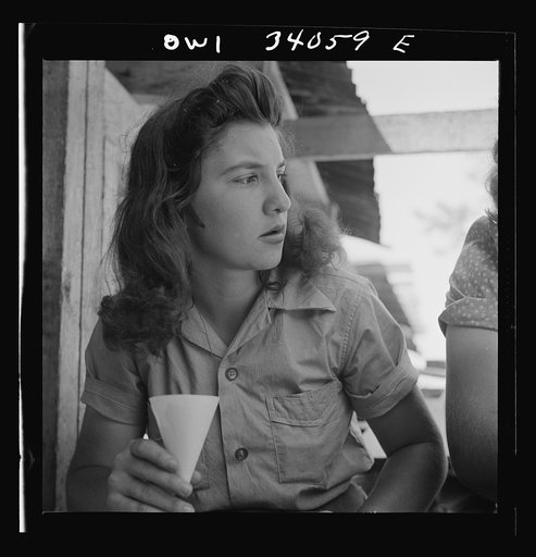 Turkey Pond, near Concord, New Hampshire. Women workers employed by a U.S. Department of Agriculture timber salvage sawmill. Eighteen year old "pit-woman," Norma Webber, agrees with her sister that sawmill work is harder physically than working in a laundry, but it isn't so tedious, and is easier on