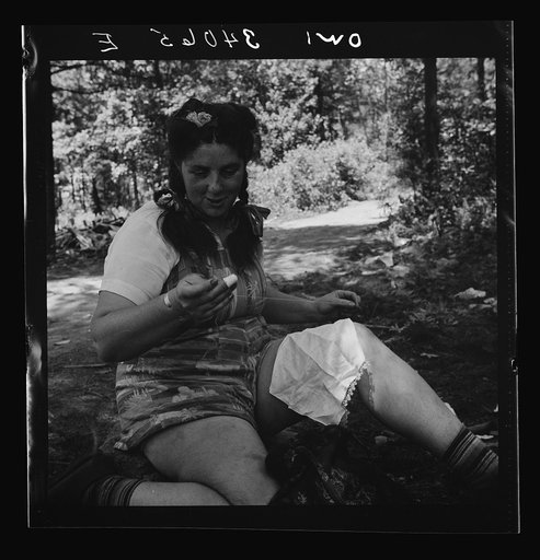 Turkey Pond, near Concord, New Hampshire. Women workers employed by a U.S. Department of Agriculture timber salvage sawmill. Mrs. Violet Storey, "take-away," brought her sewing along to make full use of her lunch hour. She is a farmer's wife and the mother of six children