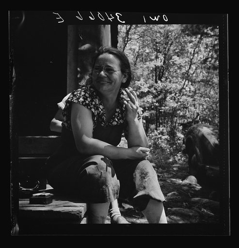 Untitled photo, possibly related to: Turkey Pond, near Concord, New Hampshire. Women workers employed by U.S. Department of Agriculture timber salvage sawmill. Mrs Dorothy De Greenia, slip woman, doesn't find the job hard after years of houswork. Mrs. De Greenia's husband, Raymond, is a sawyer at Tu