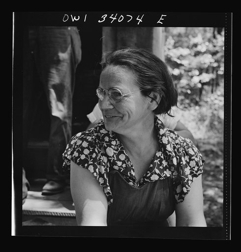 Turkey Pond, near Concord, New Hampshire. Women workers employed by U.S. Department of Agriculture timber salvage sawmill. Mrs. Dorothy De Greenia, slip woman, doesn't find her job hard after years of housework. Mrs. De Greenia's husband, Raymond, is a sawyer at Turkey Pond. They have a son in the U