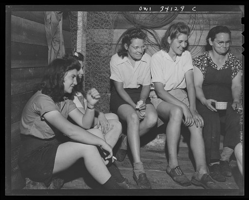 Turkey Pond, near Concord, New Hampshire. Women workers employed by a U.S. Department of Agriculture timber salvage sawmill. Employees eating their lunch in a shed. From left to right: Norma Webber, pit woman; Mrs. Violet Storey, take-away; Mrs. Elizabeth Esty, pond woman; Florence Drouin, pond woma