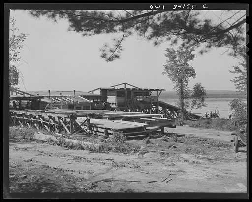 Turkey Pond, near Concord, New Hampshire. Women workers employed by a U.S. Department of Agriculture timber salvage sawmill