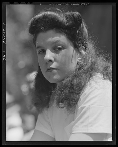 Turkey Pond, near Concord, New Hampshire. Women workers employed by a U.S. Department of Agriculture timber salvage sawmill. Barbara Webber, twenty-one year old edger, used to take care of children and has also been a waitress. Her younger sister, Norma, also works at Turkey Pond