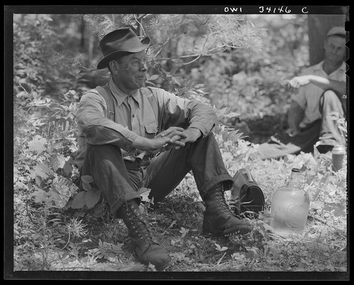 Turkey Pond, near Concord, New Hampshire. An employee of a U.S. Department of Agriculture timber salvage sawmill which employs women for most of the work. Lumbering used to be stictly a man's world. Old time lumber men will gape with wonder at the ease with which these women do their small sawmill j