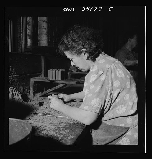 New Britain, Connecticut. Women employed at the Landers, Frary and Clark plant. Making core molds for food choppers to be used by the army