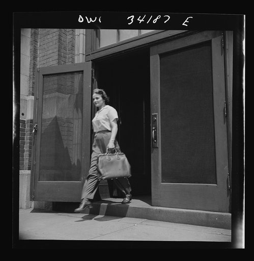 Untitled photo, possibly related to: New Britain, Connecticut. Women employed at Landers, Frary and Clark plant. A shuttle driver