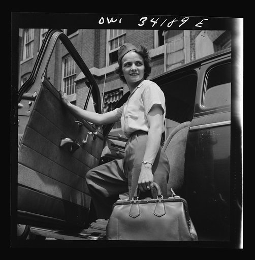 New Britain, Connecticut. Women employed at Landers, Frary and Clark plant. A shuttle driver