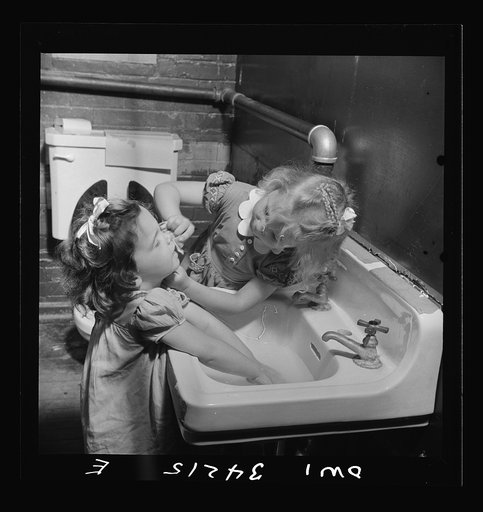 New Britain, Connecticut. A child care center opened September 15, 1942, for thirty children, ages two through five of mothers engaged in war industry. The hours are 6:30 a.m. to 6 p.m. six days per week. Washing up for lunch