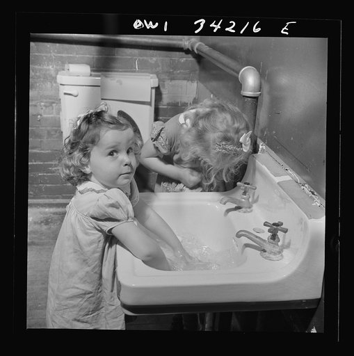 New Britain, Connecticut. A child care center opened September 15, 1942, for thirty children, ages two through five of mothers engaged in war industry. The hours are 6:30 a.m. to 6 p.m. six days per week. Washing up for lunch