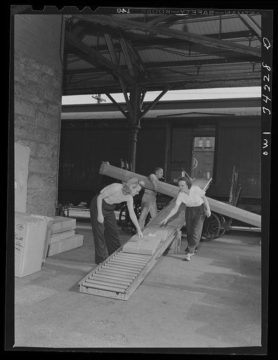 New Britain, Connecticut. Mrs. Dorothy Bell and Miss Ida Hicks, employed at the American Railway Express Company, earn thirty-three dollars and twenty-six cents per week, sorting, weighing, and stamping packages
