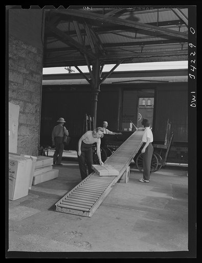Untitled photo, possibly related to: New Britain, Connecticut. Mrs. Dorothy Bell and Miss Ida Hicks, employed at the American Railway Express Company, earn thirty-three dollars and twenty-six cents per week, sorting, weighing, and stamping packages