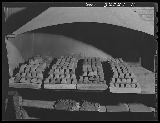 New Britain, Connecticut. Hot cores under a cooling ventilator in the Lander, Frary and Clark plant