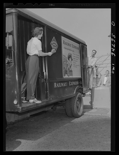 Untitled photo, possibly related to: New Britain, Connecticut. Mrs. Dorothy Bell, twenty-seven years old, mother of two children, employed at the American Railway Express Company, earns thirty-three dollars twenty-six cents per week. Her main job is sorting, weighing, handling and stamping packages