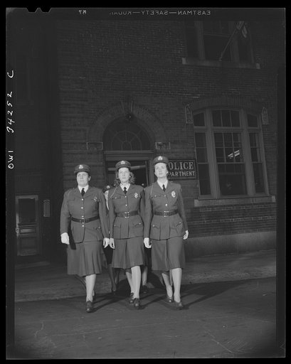 New Britain, Connecticut. Auxiliary policewomen leaving headquarters for patrol duty