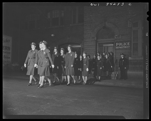 New Britain, Connecticut. Auxiliary policewomen leaving headquarters for patrol duty