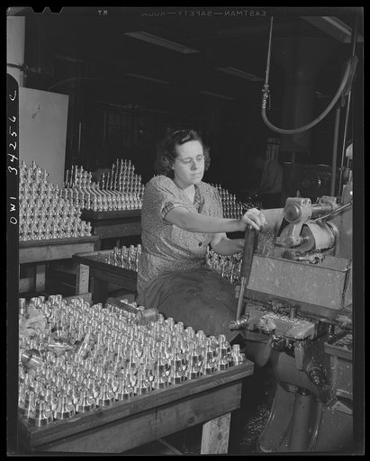 New Britain, Connecticut. Women employed at the Landers, Frary and Clark plant. Drilling holes in bomb fuses