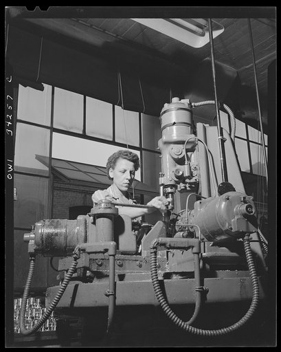 New Britain, Connecticut. Women employed at the Landers, Frary and Clark plant. Drilling holes in bomb fuses
