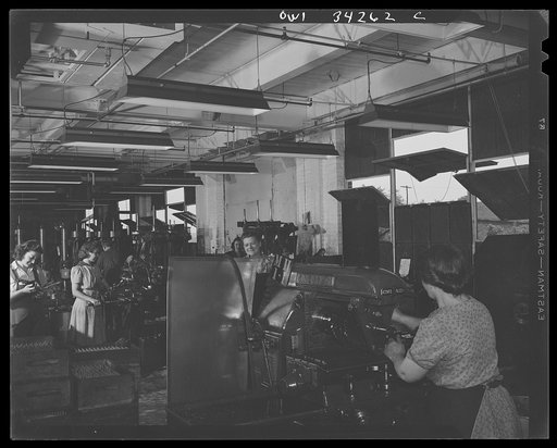 Untitled photo, possibly related to: New Britain, Connecticut. Women at the Landers, Frary and Clark plant making parts for anti-aircraft guns