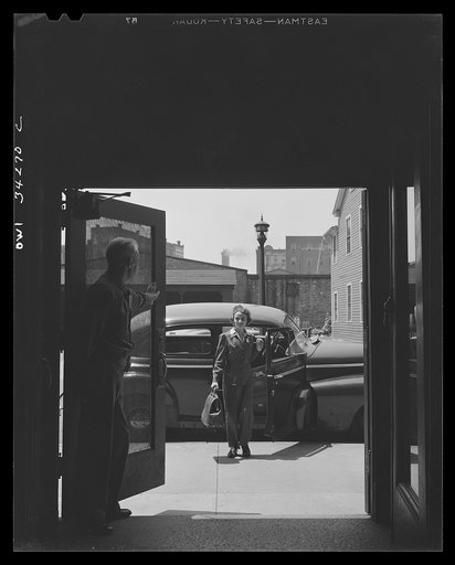 New Britain, Connecticut. A woman driving the shuttle truck between the plants of the Fafnir Bearing Company, delivering packages and passengers