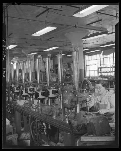 New Britain, Connecticut. Punch press machines run by the women at the Landers, Frary, and Clark plant