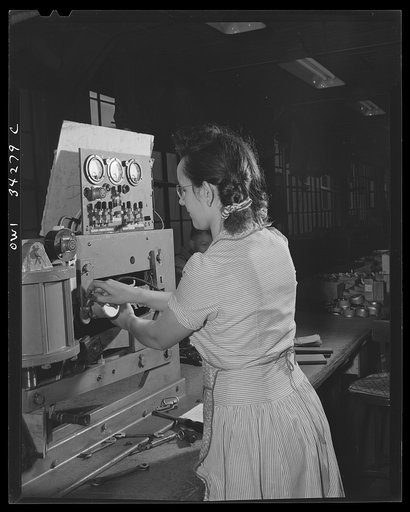 New Britain, Connecticut. A girl at the Fafnir Bearing Company testing bomb shackles