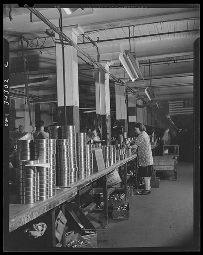 New Britain, Connecticut. Row of ball bearing rings waiting to be inspected at the Fafnir Bearing Company
