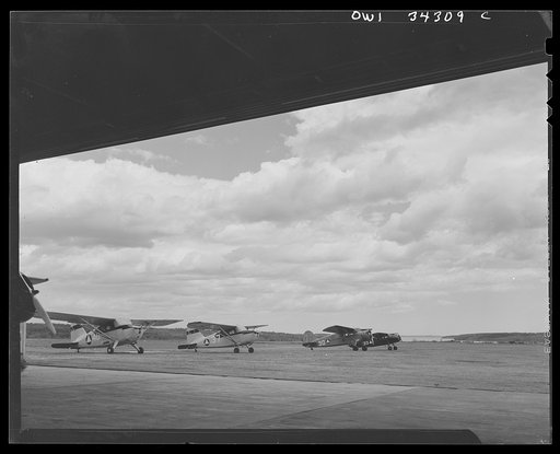 Bar Harbor, Maine. Civil Air Patrol base headquarters of coastal patrol no. 20. The flying field from the hangar