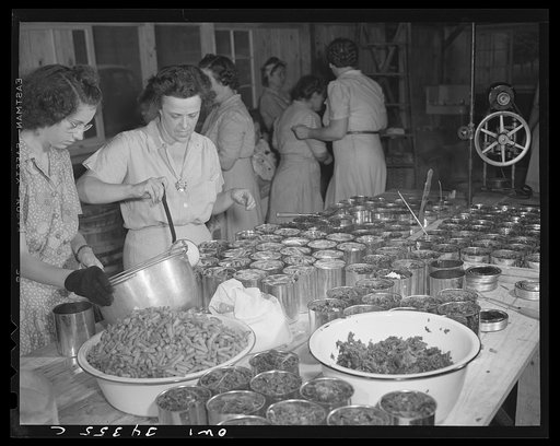 Jeffersontown, Kentucky. The Jefferson County ommunity cannery, started by the WPA (Work Projects Administration), now conducted by the state (?) vocational education department. Women pay three cents each for cans and two cents per can for use of the pressure cooker. Canning beans and greens raised