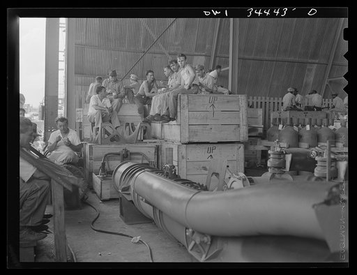 Higgins shipyards, New Orleans, Louisiana. Shipyard workers on their lunch hour