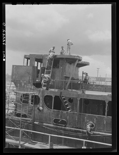 Cargo vessel under construction at the Higgins shipyards, New Orleans, Louisiana