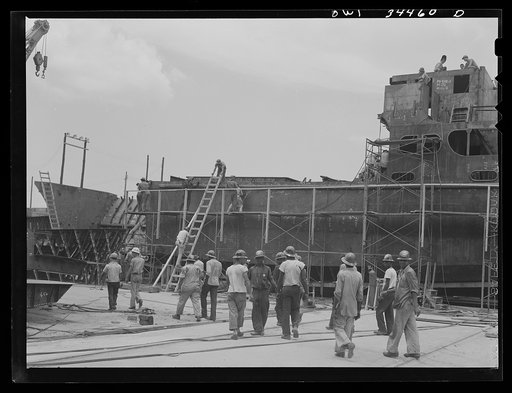 Higgins shipyards workmen going back to work after lunch hour. New Orleans, Louisiana