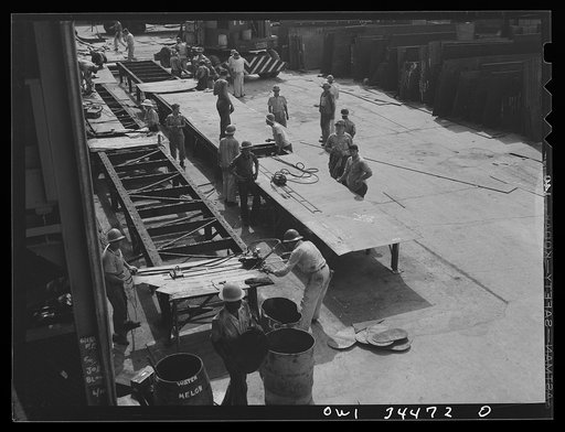Getting steel plates ready for installation. Higgins shipyards, New Orleans, Louisiana