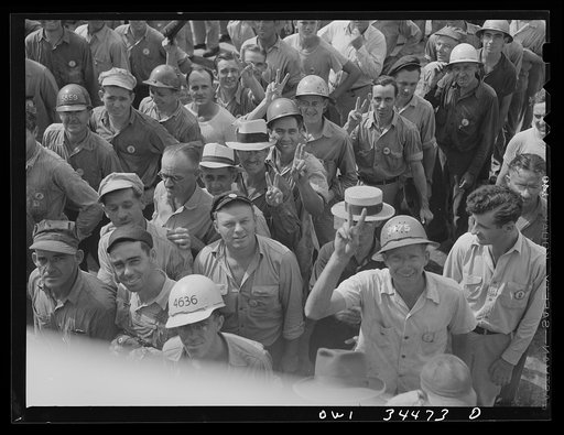 New Orleans, Louisiana. Higgins shipyard workers leaving the plant at four pm