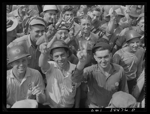 New Orleans, Louisiana. Higgins shipyard workers leaving the plant at four pm