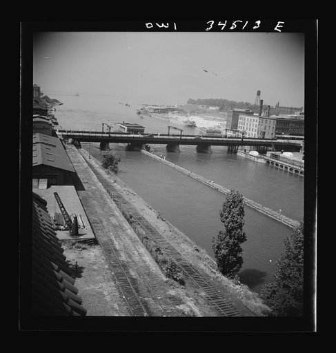 Oswego, New York. The Oswego River, looking toward Lake Ontario. Bauxite docks are on the far right