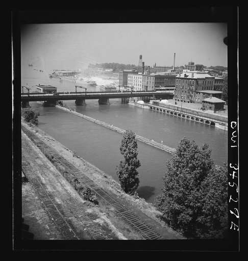 Oswego, New York. The Oswego River, looking toward Lake Ontario. Bauxite docks are on the far right