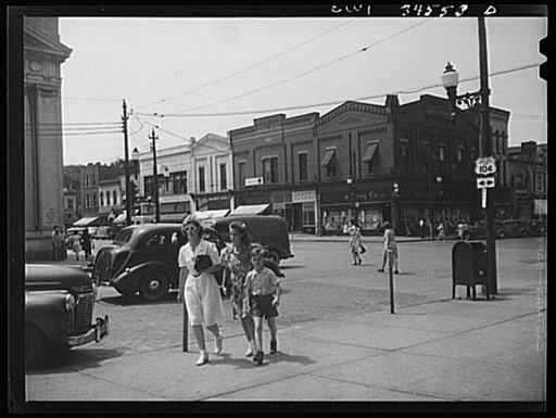 Untitled photo, possibly related to: Oswego, New York. The main shopping center at the corner of Bridge and First street