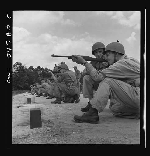 Warner Robins, Georgia. Air Service Command, Robins Field. Enlisted men of  a depot group learning to handle a carbine
